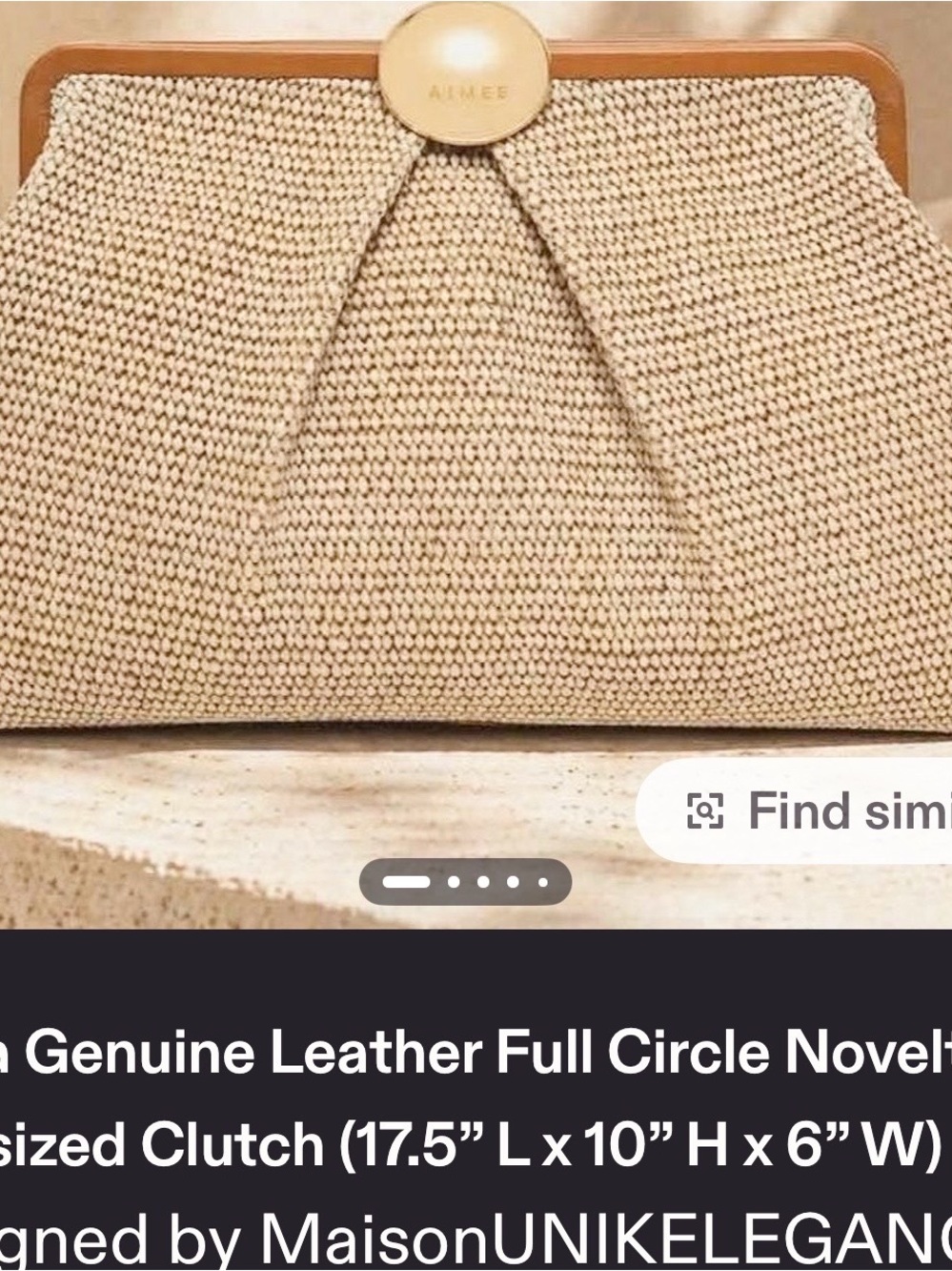 Aimee Kestinberg…Natural Raffia Oversized Clutch with Leather Trim.